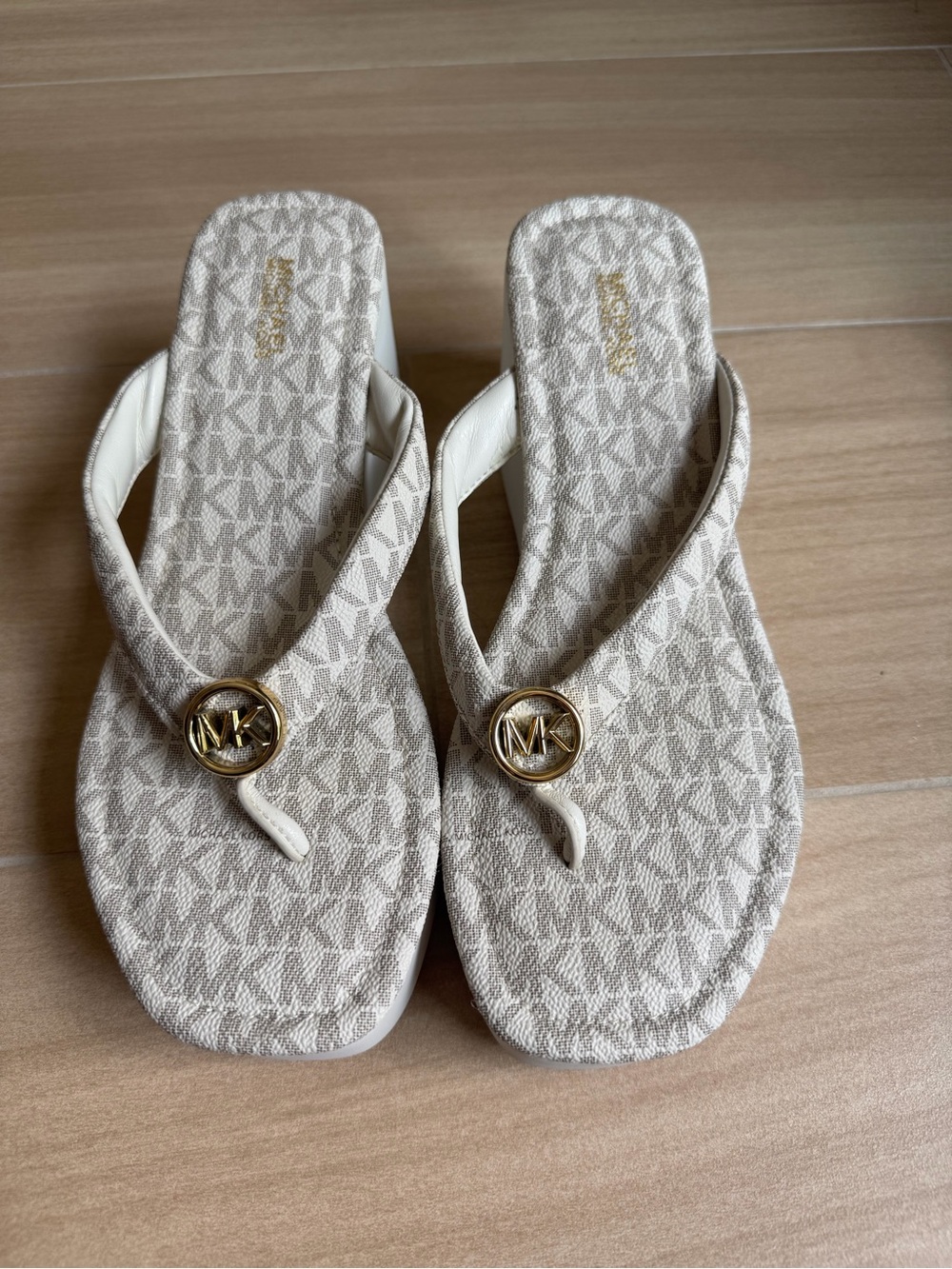Michael Kors Cream/Tan MK Logo Thong wedge sandals with Gold Emblem